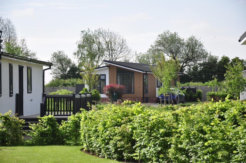 a perfect residential park with homes and lots of greenery